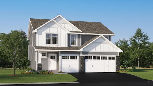 view of front of house featuring driveway, a shingled roof, a front lawn, and board and batten siding