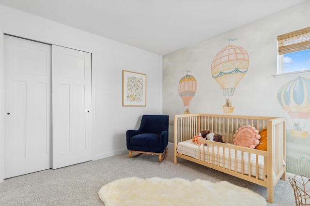 bedroom featuring carpet and a closet