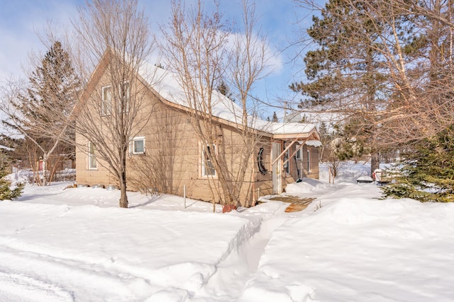 view of snow covered property