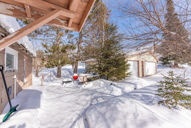 yard covered in snow with an outdoor structure