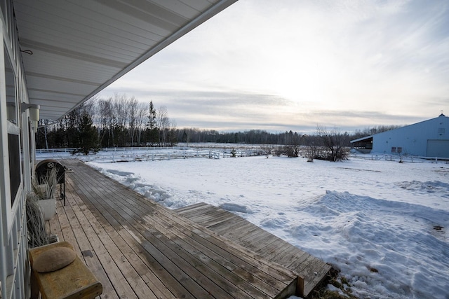 view of snow covered deck