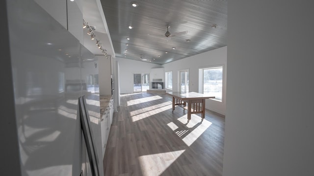 interior space with lofted ceiling, wood finished floors, wood ceiling, and recessed lighting