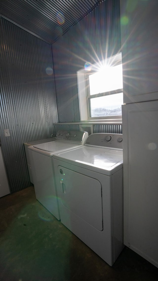 laundry room featuring laundry area and washer and clothes dryer