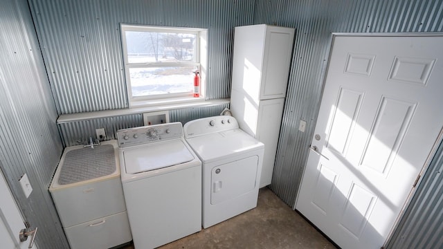 laundry area featuring independent washer and dryer