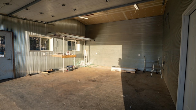 interior space featuring concrete flooring