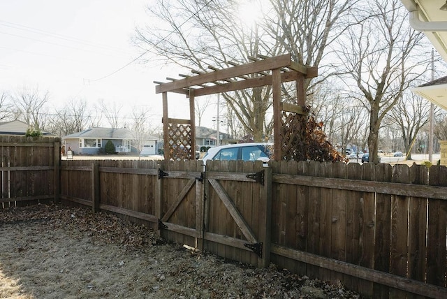 view of yard with a gate and fence