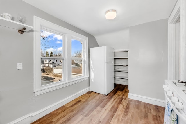 walk in closet featuring light wood-type flooring