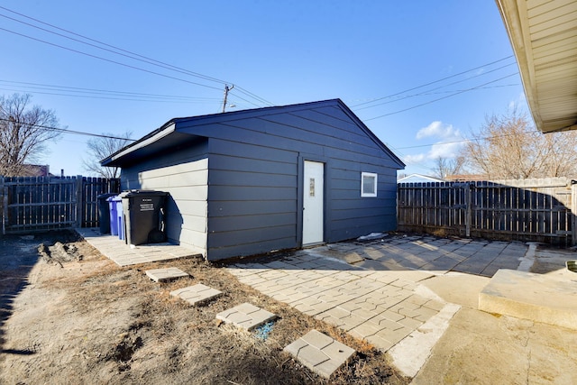 view of outdoor structure featuring fence