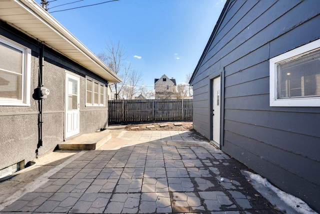 view of patio with fence