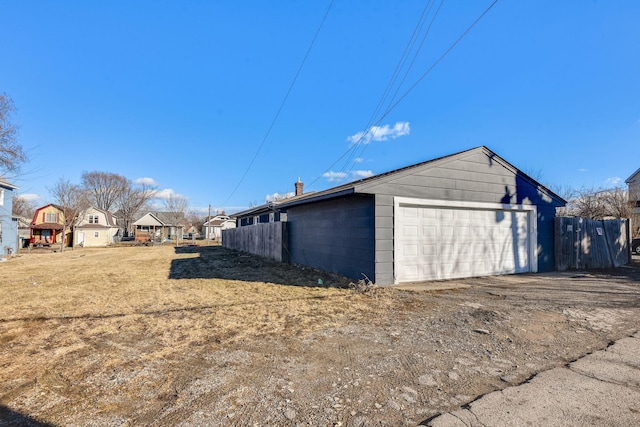 detached garage with fence