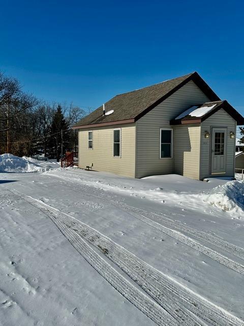 view of snow covered property