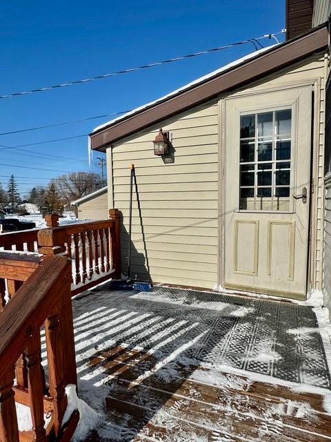 view of snow covered deck