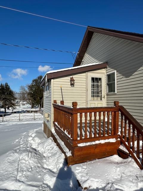 view of snow covered deck