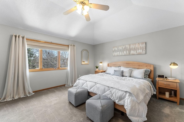 bedroom featuring baseboards, carpet floors, lofted ceiling, and ceiling fan