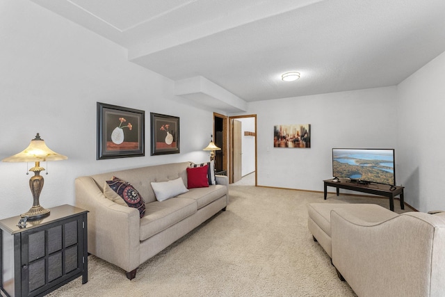 living room featuring baseboards and light carpet