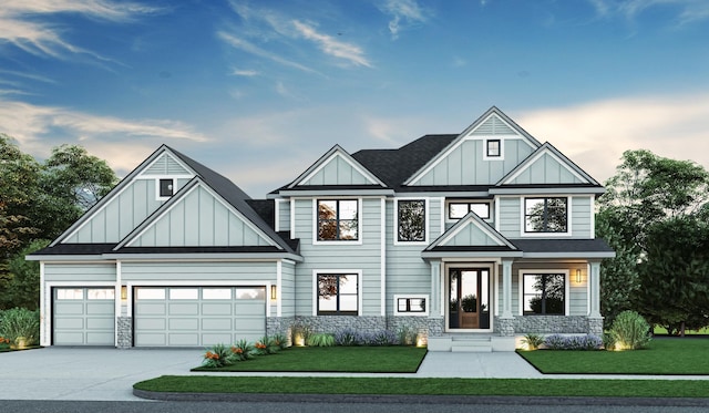 view of front facade with driveway, stone siding, a front lawn, and board and batten siding