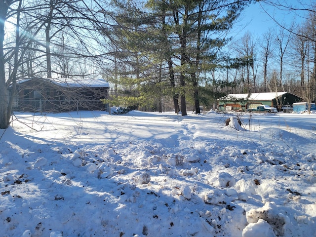 view of yard covered in snow