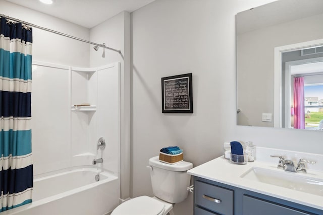 full bath featuring toilet, shower / bath combo, vanity, and visible vents