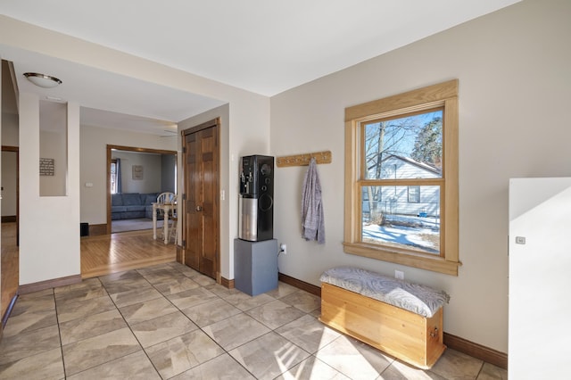 bathroom featuring tile patterned floors and baseboards