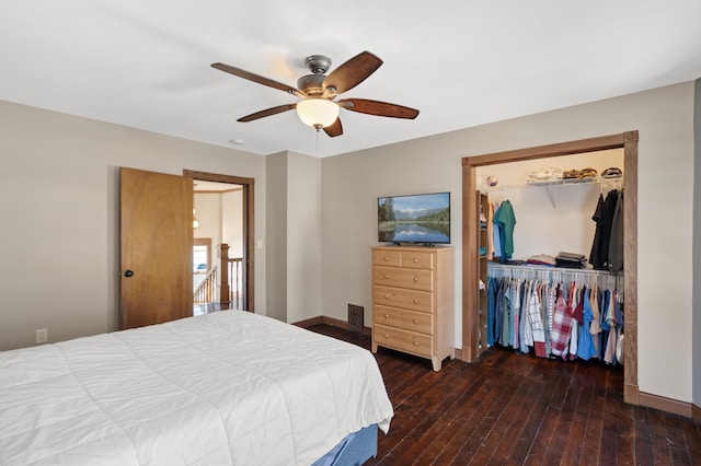 bedroom featuring hardwood / wood-style floors, baseboards, a closet, and ceiling fan