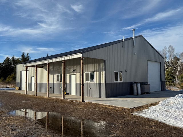 exterior space featuring a detached garage