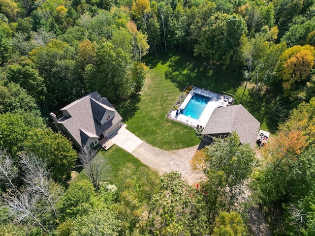 aerial view with a wooded view