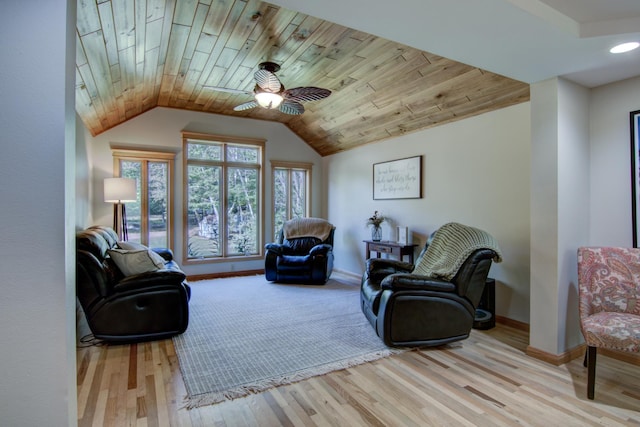 living area with lofted ceiling, ceiling fan, wooden ceiling, baseboards, and light wood-style floors