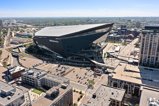 birds eye view of property with a view of city