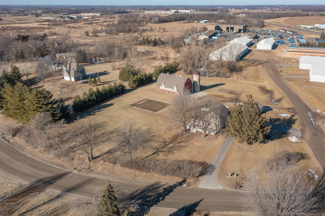 birds eye view of property featuring a rural view