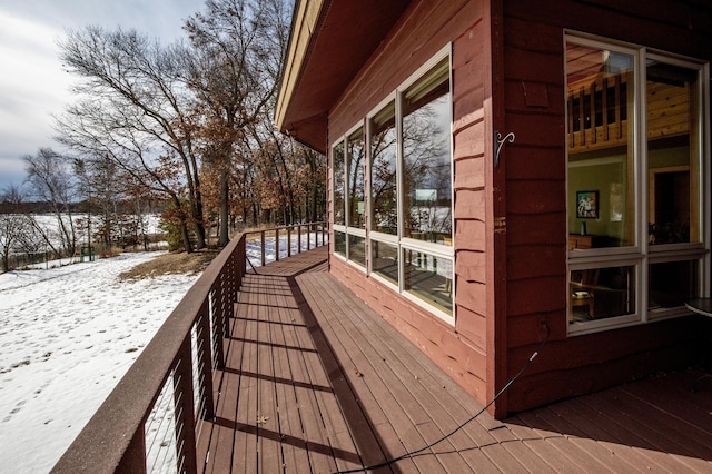 view of snow covered deck