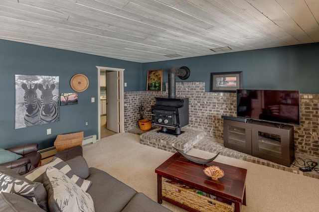 living room featuring a wood stove, wooden ceiling, carpet floors, and baseboard heating