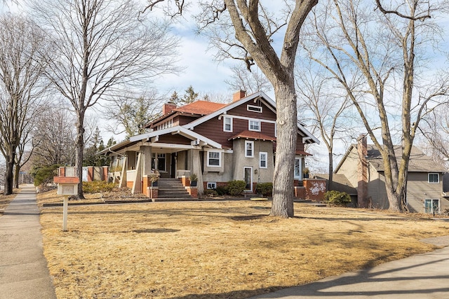 craftsman house with a chimney