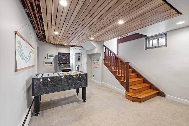 playroom with wood ceiling, carpet flooring, and baseboards