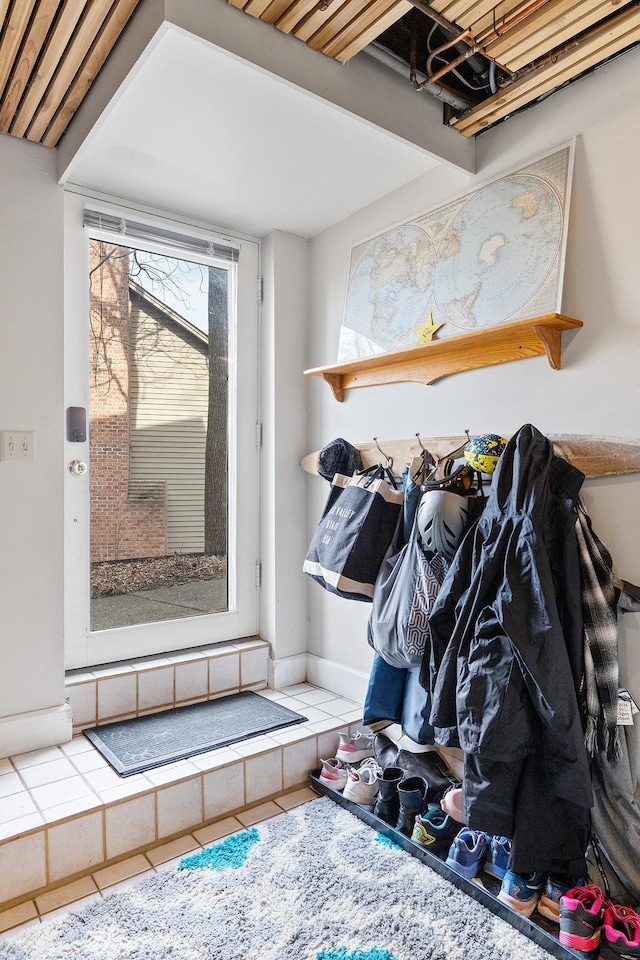 mudroom featuring baseboards