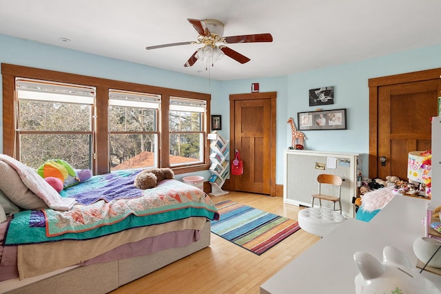 201 2nd St, Excelsior, MN 55331 - bedroom featuring wood finished floors and ceiling fan
