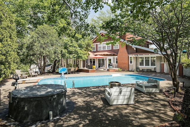 201 2nd St, Excelsior, MN 55331 - outdoor pool featuring a hot tub and a patio area