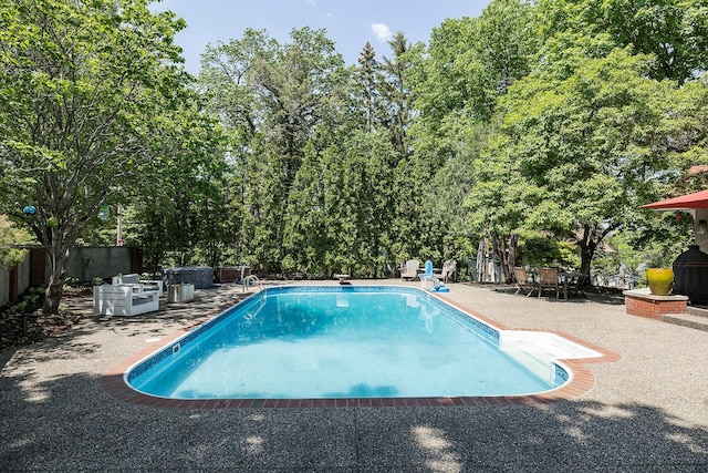 201 2nd St, Excelsior, MN 55331 - view of pool featuring a patio, fence, and a diving board