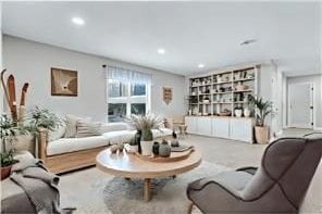 living area with recessed lighting