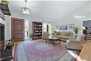 living room with wood finished floors