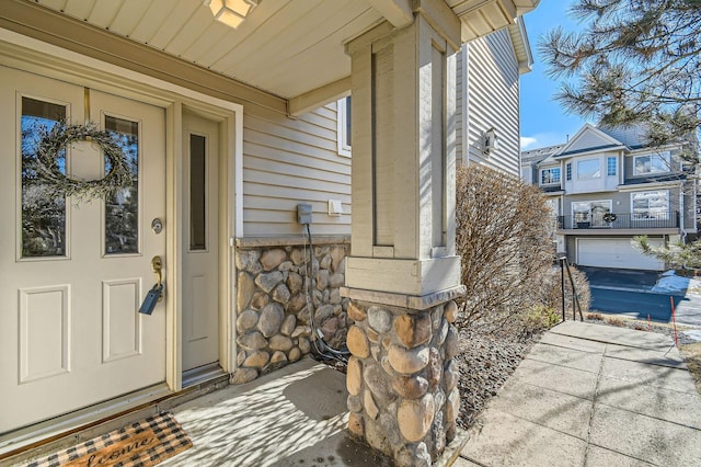 view of exterior entry with stone siding