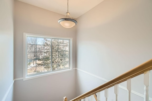 stairs featuring plenty of natural light