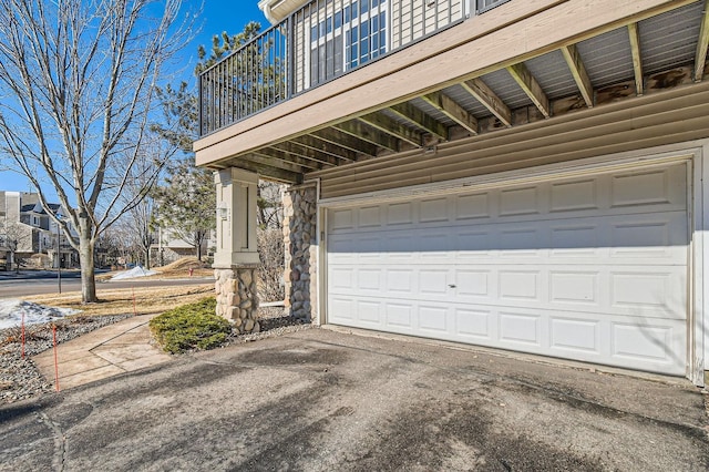 garage featuring driveway