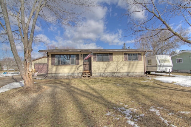 view of front of property featuring a front yard and entry steps