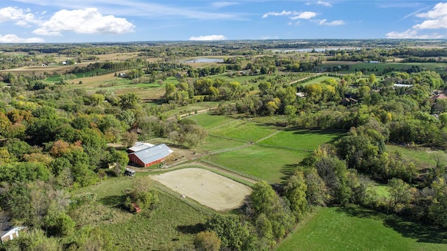 birds eye view of property with a rural view