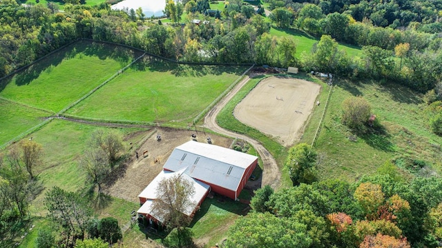 birds eye view of property featuring a rural view