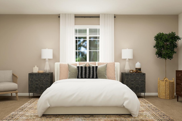 bedroom featuring carpet floors and baseboards