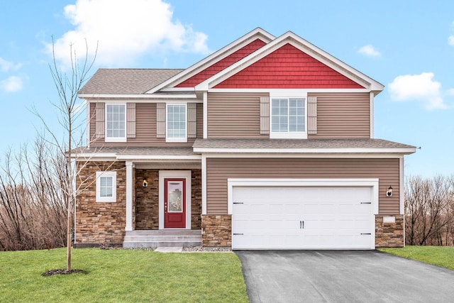 craftsman-style house featuring stone siding, aphalt driveway, an attached garage, a front lawn, and a shingled roof