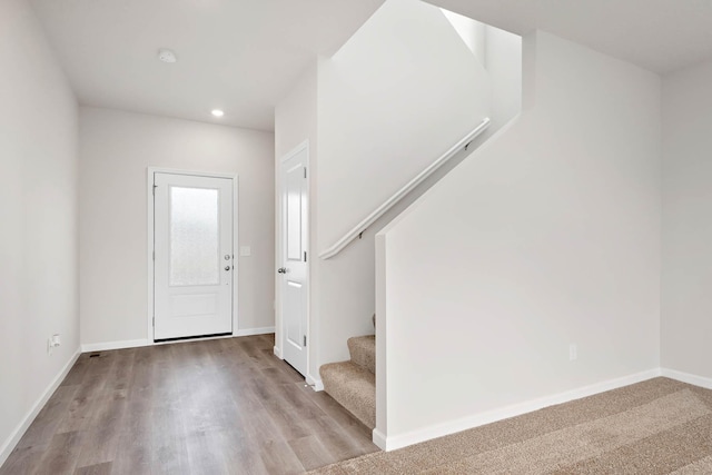 10097 Twin Lakes Pkwy NW, Elk River, MN 55330 - foyer entrance featuring stairs, wood finished floors, and recessed lighting
