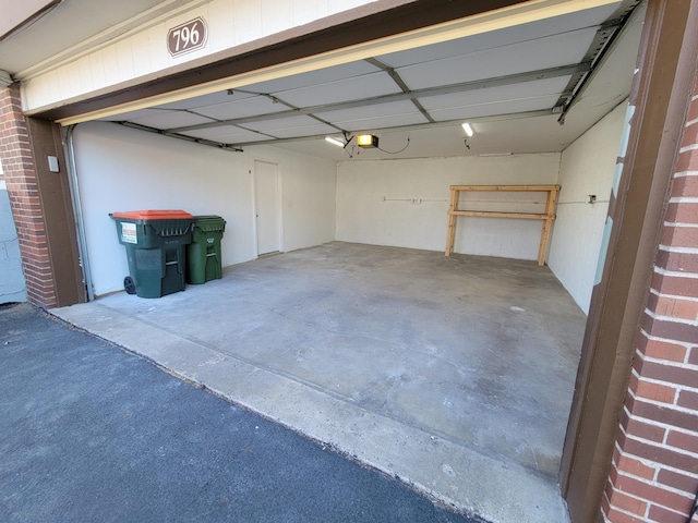 garage featuring a garage door opener