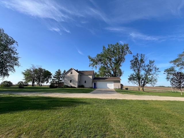 38184 County 47th Blvd, Goodhue, MN 55027 - traditional home with concrete driveway, a front yard, and an attached garage